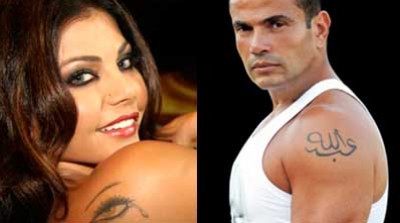 عمرو دياب يطاردني لدرجة أنه صغّر عقله ووضع وشم على كتفه مثلي