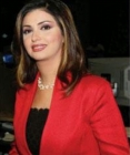 مذيعة الجزيرة ايمان عياد ترد على خبر زواجها للمرة الثالثة
