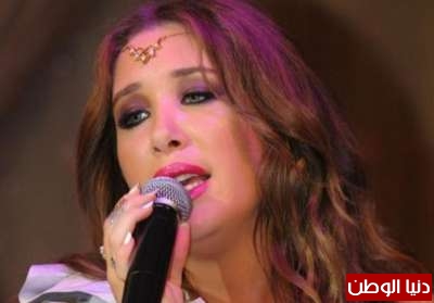 شبيهة نانسي عجرم 3909851179.jpg