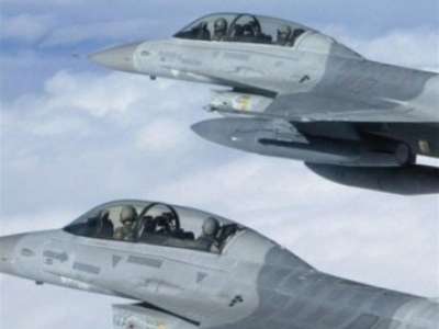 ضابط مخابرات أميركي يكشف:طائرات الناتو تنقل ترسانة القذافي إلى قواعد تركية قريبة من لواء اسكندرونة مقر الجيش السوري الحر