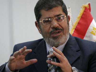 كاتب أمريكى: ضغوط خارجية دفعت 'العسكرى' لإعلان مرسى رئيساً لمصر