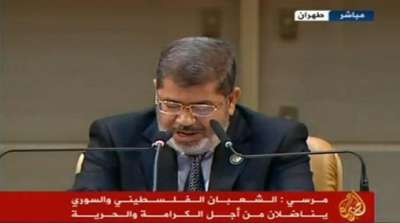 التليفزيون السورى يستعين بـ"توم وجيرى" للسخرية من مرسى..فيديو