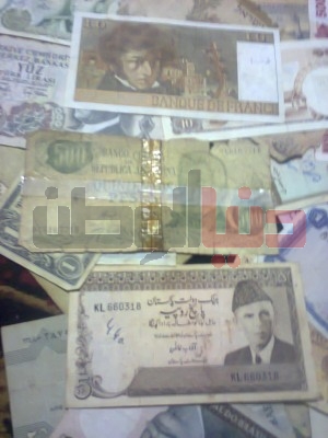 بالصور..غزّي يمتلك ورقة نقدية قديمة لكافة العالم:كل ورقة أطرفها 9998363146.jpg