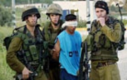 إعتقال فتى فلسطيني يحمل خمس عبوات ناسفة 