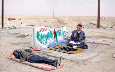 المعارضة الليبية تغير لون سياراتها لتجنب النيران الصديقة