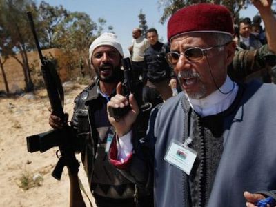 المعارضة الليبية تشترط رحيل القذافي وسيف الإسلام يعتبر الطلب سخيفا