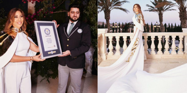 معلومات صادمة عن الرداء الذي دخلت به نجوى كرم موسوعة غينيس