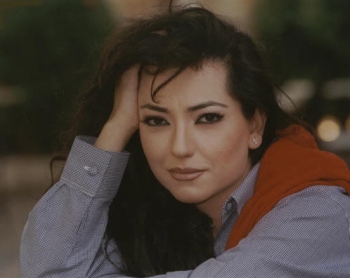 أمل عرفة لدنيا الوطن: الفنان عمل واحد لا يكفيه