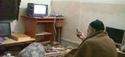 بن لادن يشاهد بن لادن ..فيديو