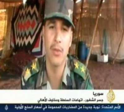 جندي سوري: طلبوا منا عدم مهاجمة المتمردين المسلحين "لأنهم معنا"