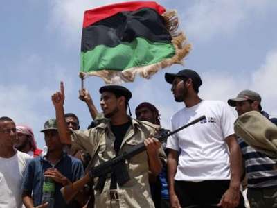 ثوار ليبيا يصدون هجوماً لكتائب القذافي ويواصلون التقدم نحو طرابلس