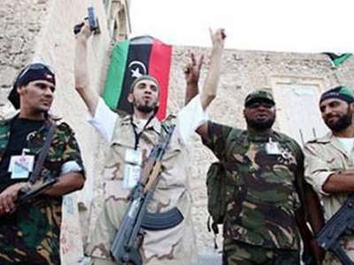 المستشار العسكري للقذافي يكشف أسراراً مثيرة عن سقوط طرابلس ونهاية العقيد