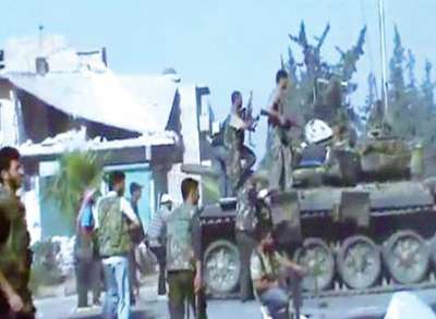 قائد الجيش السوري الحر في حلب يعلن استيلاء قواته على عدد من دبابات الجيش النظامي