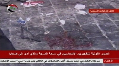 التلفزيون السوري: 14 قتيل في تفجيرين انتحاريين متعاقبين في حي المرجة بدمشق