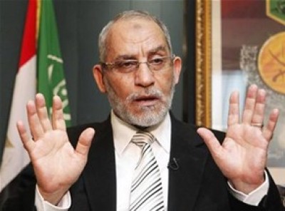 النيابة تأمر بضبط بديع وقيادات أخرى من الإخوان لاتهامهم بأحداث الحرس الجمهوري