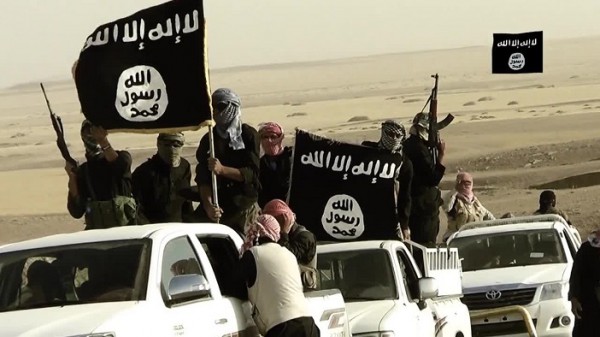 داعش يذبح كردياً مهدداً أوباما وبارزاني