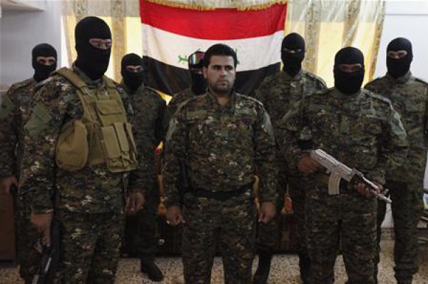 بالفيديو.. ماذا يفعل "الأسد" مع مقاتلين عراقيين؟