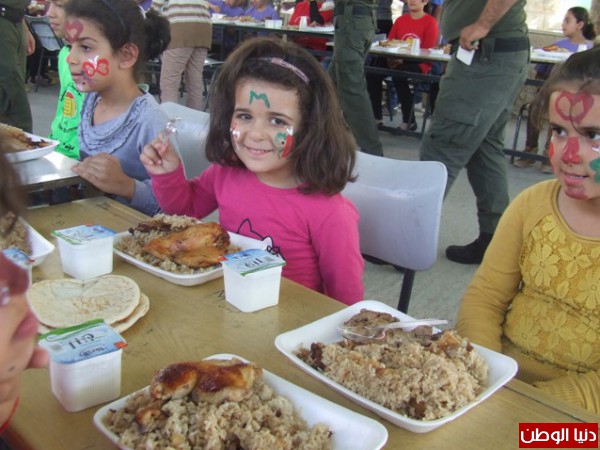قوات الأمن الوطني الفلسطيني تقدم وجبة غداء لمؤسسة الأشبال والزهرات في بلدة كفرذان