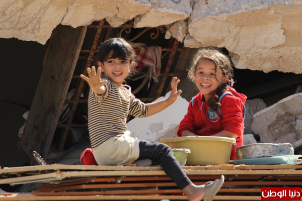 صور: أطفال خزاعة يحتفلون برأس السنة الهجرية فوق ركام منازلهم