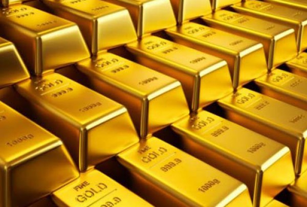 الذهب ينزل مع "تلميح"برفع الفائدة الأميركية