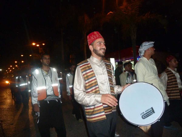 متطوعو الهلال والأمن الوطني والشرطة ينظمون مسيرة احتفالية برمضان في قلقيلية