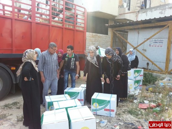 الحملة الوطنية السعودية توزع المواد الغذائية على السوريين النازحين في حلب