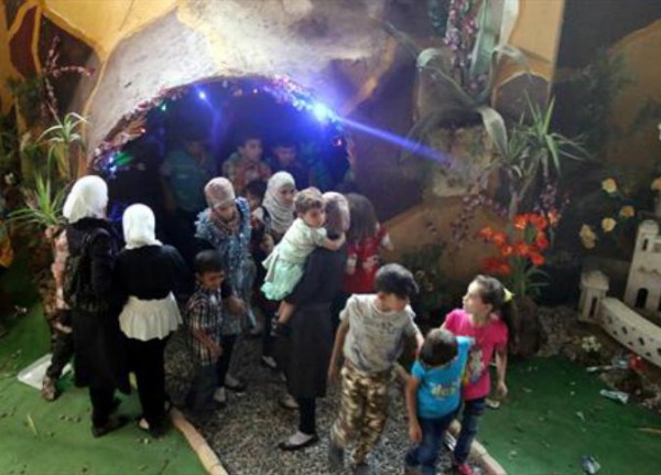 مدينة ألعاب تحت الأرض تعيد البهجة لأطفال سوريا