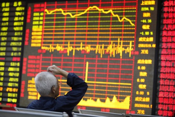 الصين: صحفي يعترف  بانه تسبب بفوضى الاسواق المالية