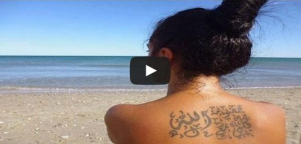 دنيا مسعود تتحدث عن وشمها الذى يحمل عبارة " خصومة قلبى مع الله "