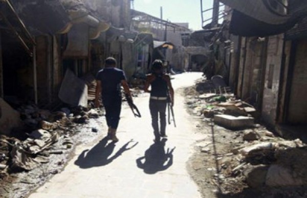 اتفاق حول خروج المسلحين تدريجيا من آخر حي يتمركزون في مدينة حمص السورية