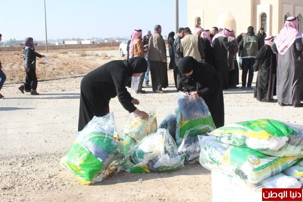 محطة التوزيع الـ16 للحملة الوطنية السعودية توزع 14 ألف قطعة شتوية على الاسر السورية اللاجئة في عمان
