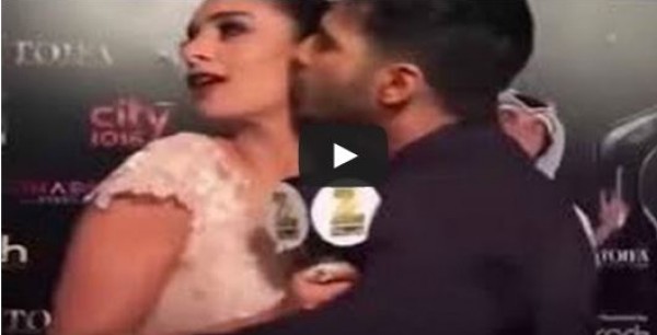 ممثل هندي يحرج مذيعة مصرية ويقبلها على الهواء
