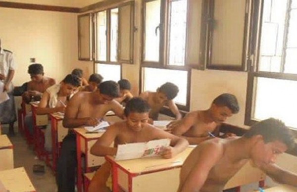 طلاب باليمن يؤدون اختباراتهم بلا قمصان بسبب الحرارة وانقطاع الكهرباء