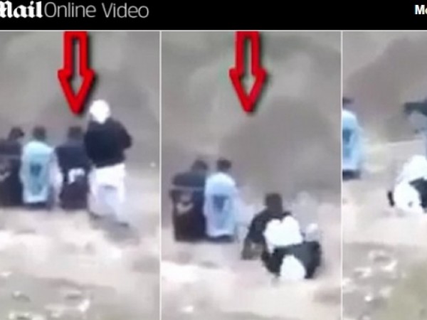 رهينة يخطف السلاح من أحد أفراد داعش ويطلق النيران عليهم