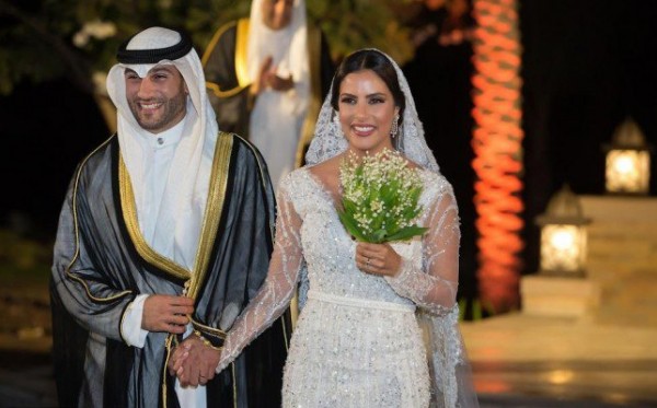 بالصور: زفاف الفاشينيستا والمليارديرة السعودية ندى باعشن يثير الجدل بسبب صغر سن عريسها!