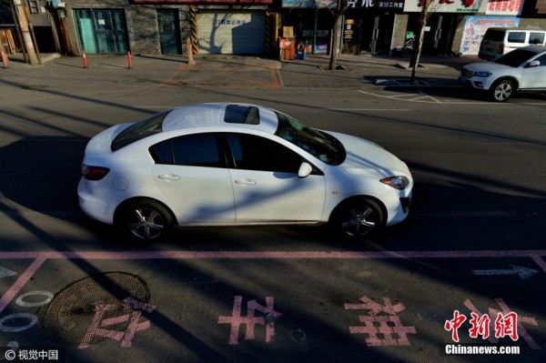 الصين تخصص موقف سيارات بلون وردى للسيدات فقط