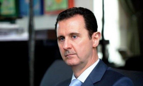 الأسد يتلقى رسالة من العبادي