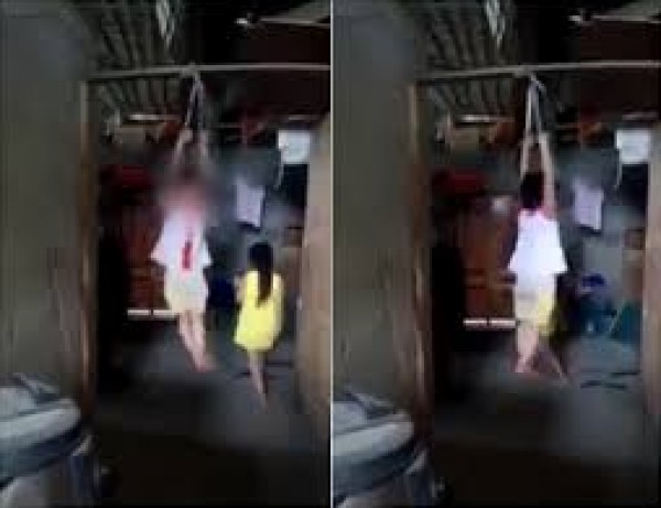 فيديو مروع لامرأة تعلق طفلة بالسقف لمعاقبتها