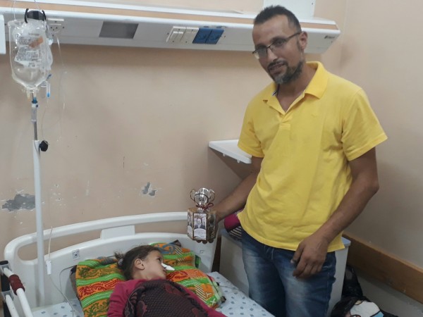 مكتب د. محمود الهباش في غزة يوزع الهدايا لابرام اتفاق المصالحة