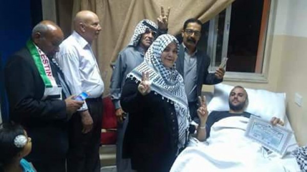 وفد من التجمع الفلسطيني للوطن يزور المصابين في مشفى مدينة الحسين الطبية