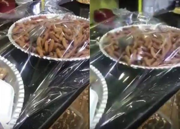 فأر "يتمختر" داخل طبق حلويات بمخبز في عُمان