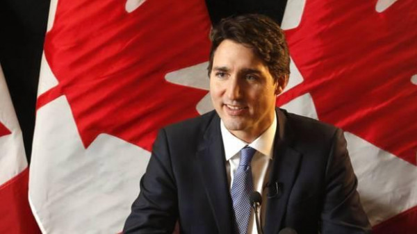 شاهد: رئيس وزراء كندا يعتذر ويطلب الصفح بسبب صورة
