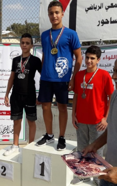 نجم القدس السباح محمود أبو غربية يحرز المركز الأول ضمن بطولة فلسطين