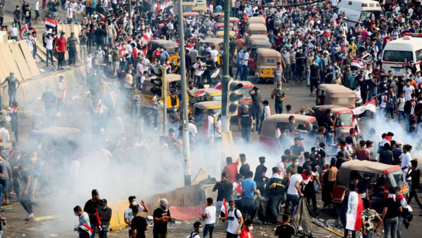 جرحى بإطلاق رصاص خلال الاحتجاجات في ساحة الخلاني بالعراق
