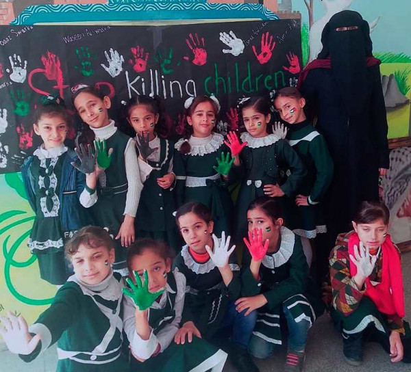 طالبات مدرسة طارق بن زياد بخانيونس ينفذن نشاط Stop killing children