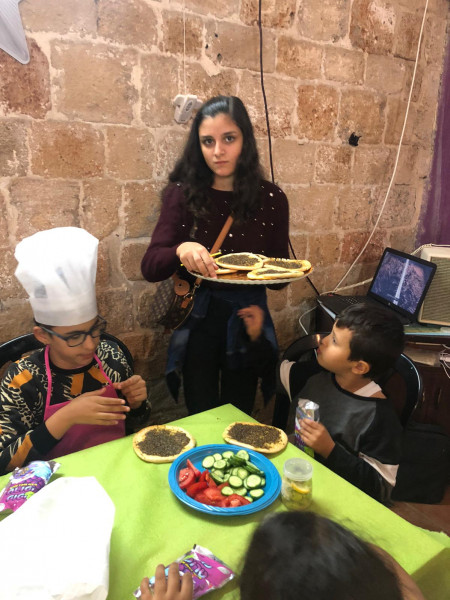 فعالية الزيت والزيتون في مركز المينا التربوي العكي