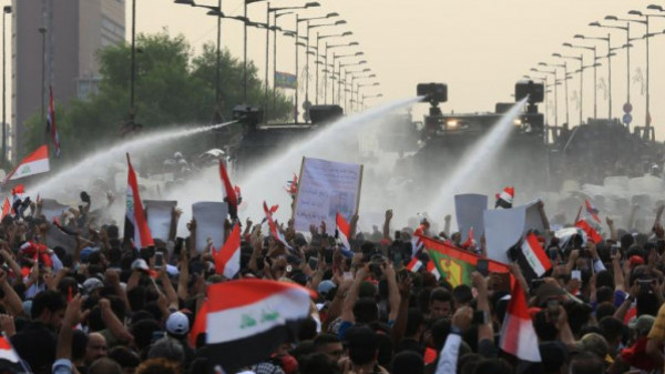 حركة عراقية تتوعد أمريكا وإسرائيل بدفع ثمن دماء المتظاهرين