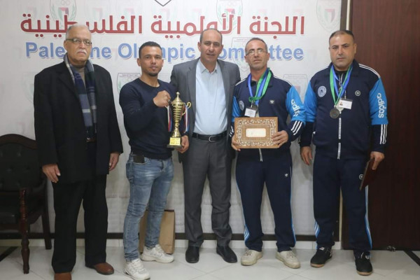 الاولمبية تكرم لاعبي منتخب فلسطين لثني الذراعين المتوجين بالبطولة العربية بالإسكندرية