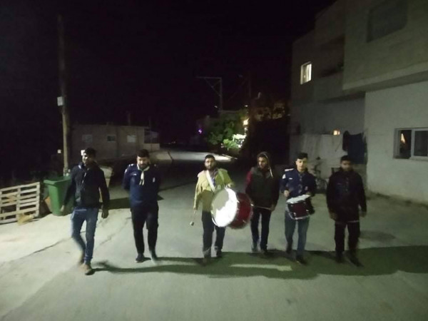 مجموعة أبناء الريف الكشفية تقوم بدور "المسحراتي"