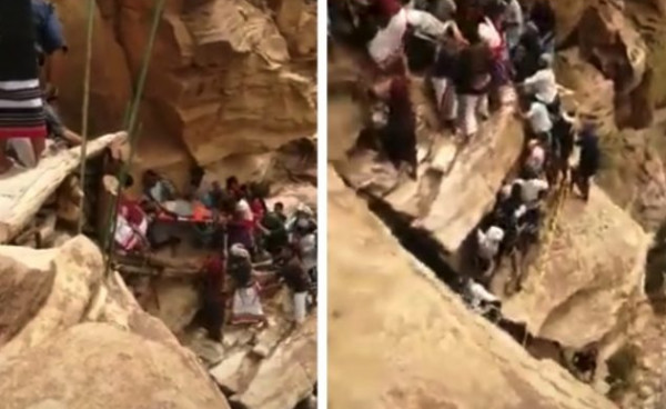 سلسلة بشرية.. شاهد لحظة إنقاذ شخص سقط من أعلى جبال بالسعودية